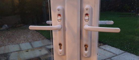 Upvc handles lockable by button fitted by AJK LOCKS