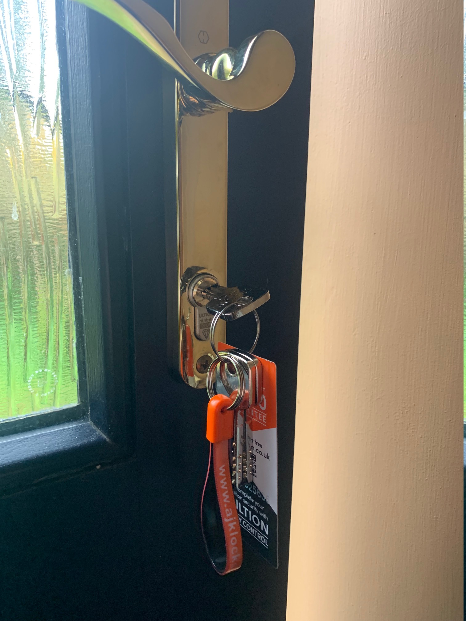 Locksmith upgrading door lock to high-security standard in Hook Norton property