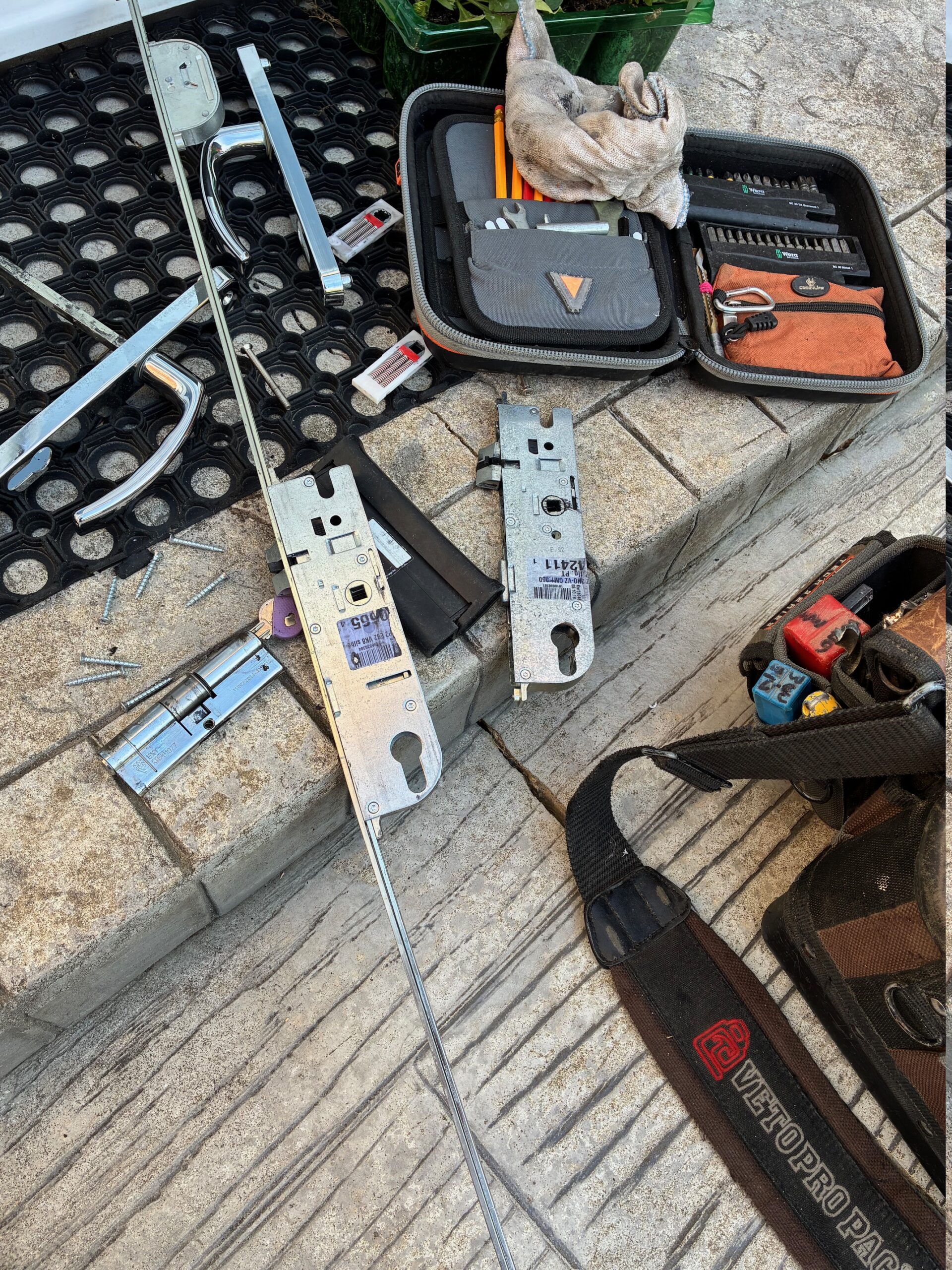 “Long Compton Locksmiths professional unlocking a residential door with specialized tools”