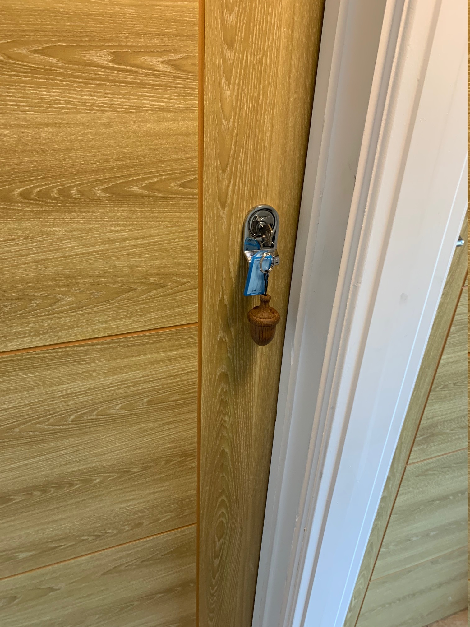 Locksmith from Yarnton Locksmiths repairing a door lock
